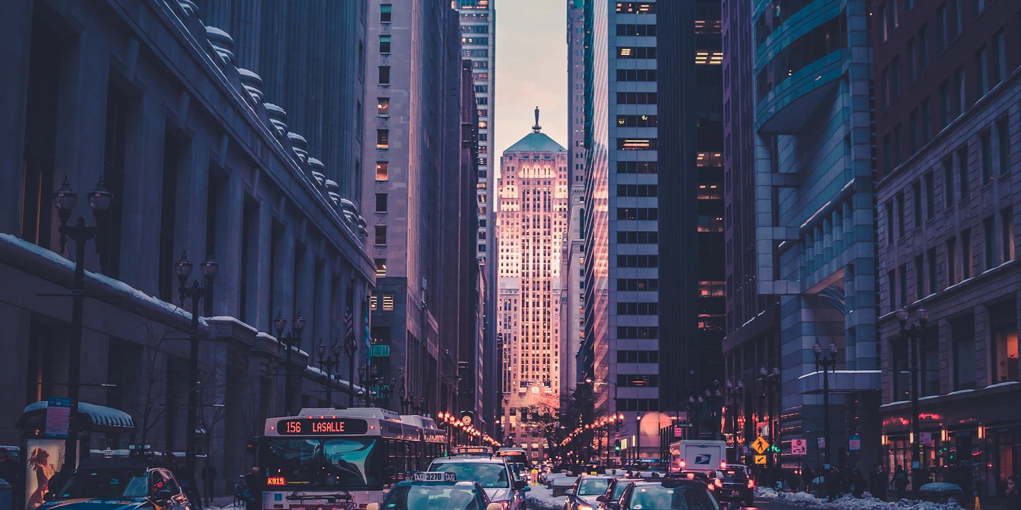City streets at golden hour, a person walking with a sense of possibility