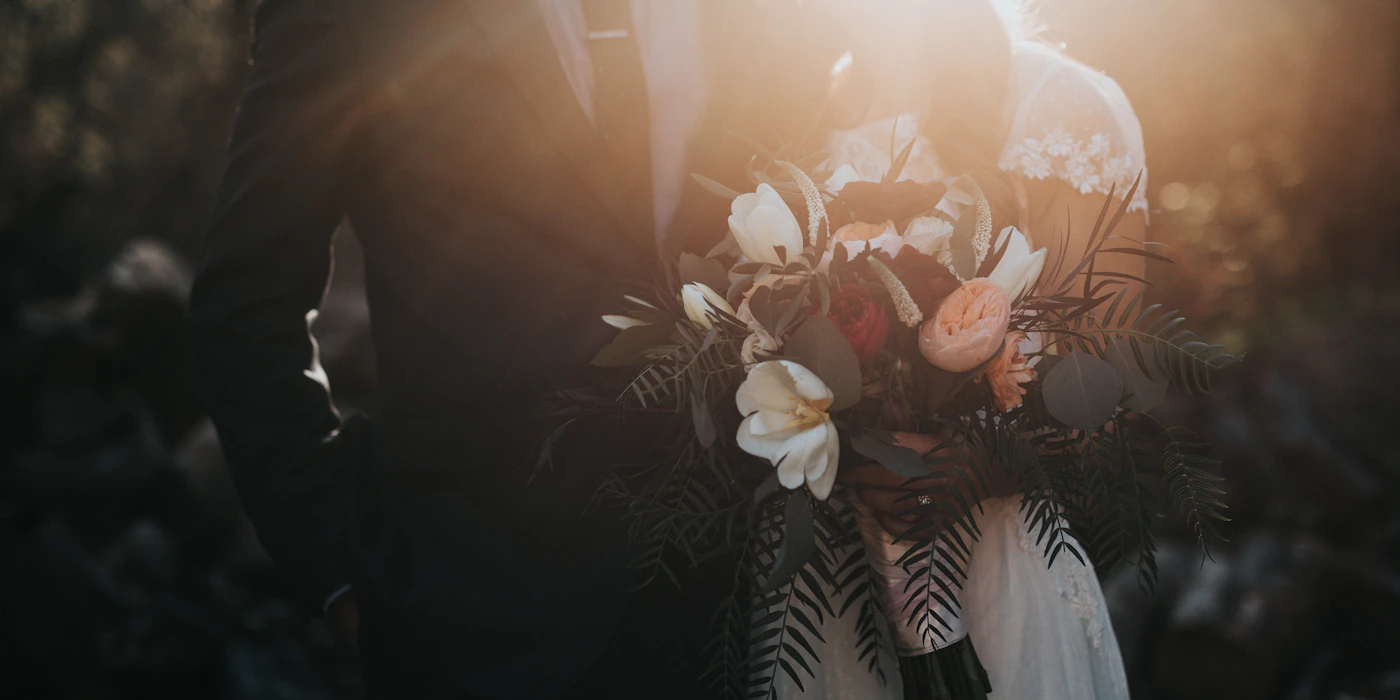 Couple holding hands considering marriage vs long-term partnership